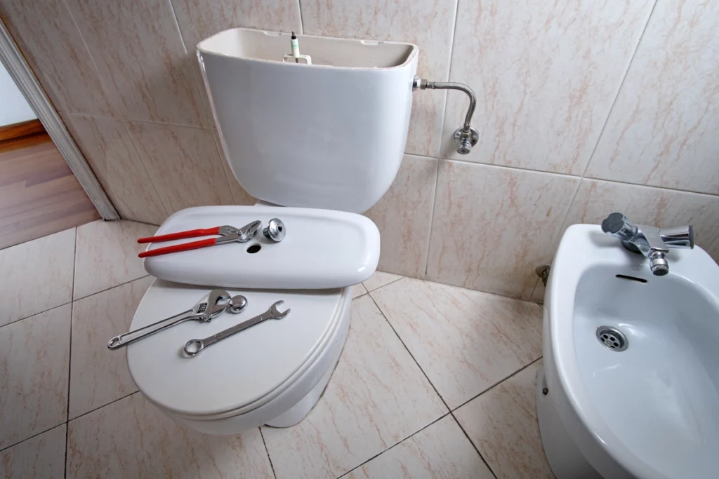 installing toilet in home bathroom plumbing