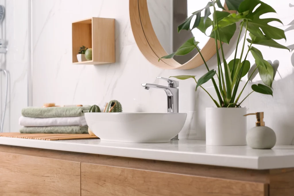Contemporary bathroom renovation with drop in sink on countertop